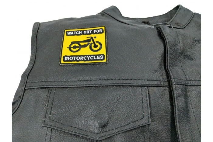 Watch Out For Motorcycles Patch - 2.75x2.75 inch. Embroidered Iron on Patch shown on leather vest