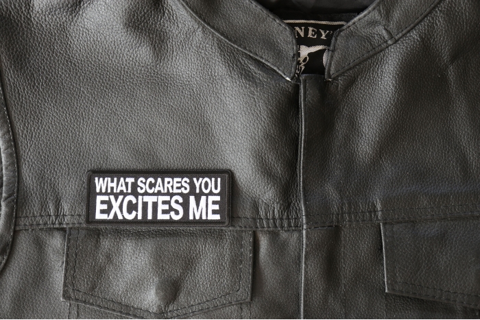 What Scares you Excites Me Patch, Biker Saying Patches shown on leather vest