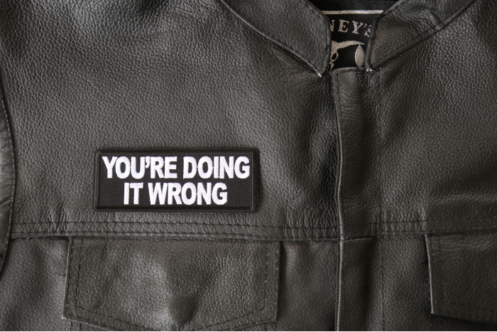 You're Doing it Wrong Patch, Biker Saying Patches shown on leather vest