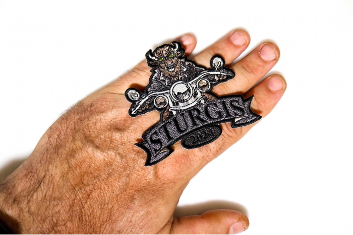 Sturgis 2024 Patch Buffalo Biker Riding Motorcycle shown on hand for size comparison