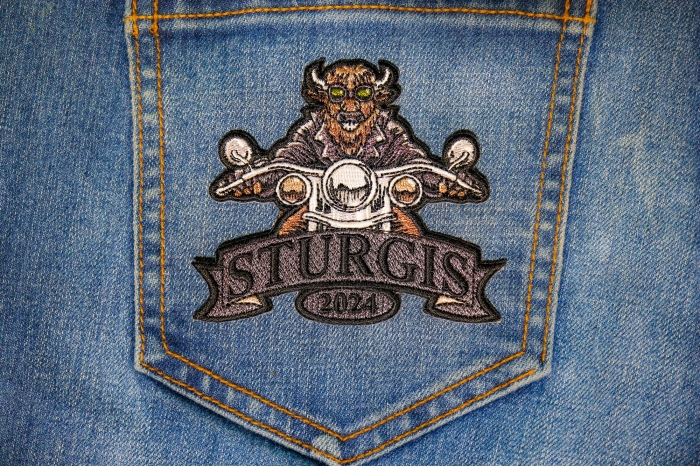 Sturgis 2024 Patch Buffalo Biker Riding Motorcycle shown on jeans