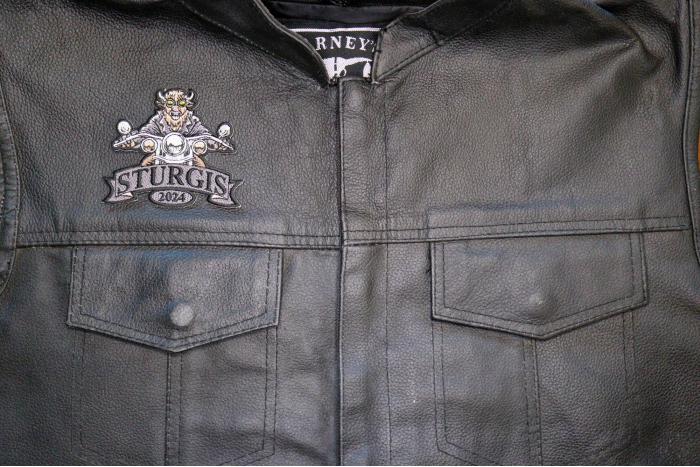 Sturgis 2024 Patch Buffalo Biker Riding Motorcycle shown on leather vest