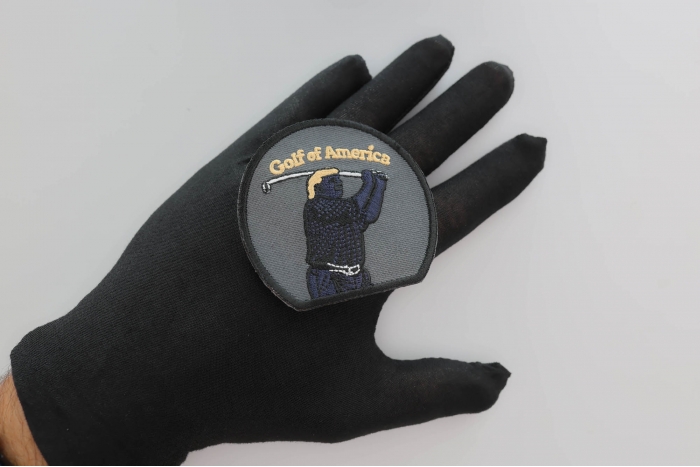 Donald Trump Golf of America Patch shown on hand for size comparison