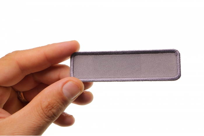  shown on hand for size comparison