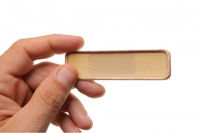  shown on hand for size comparison