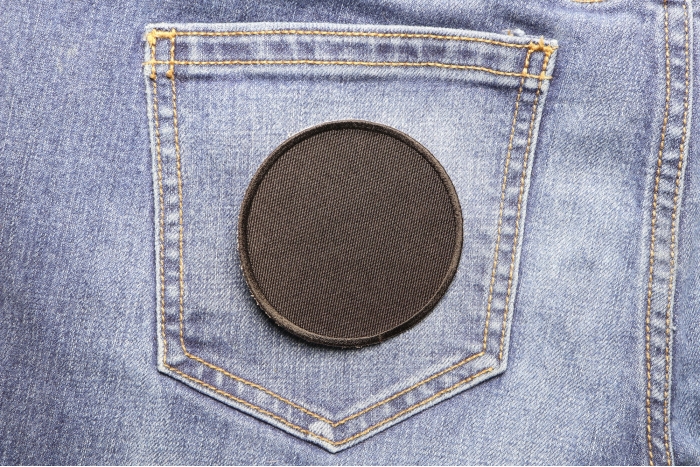 Black 3 Inch Round Blank Patch shown on jeans