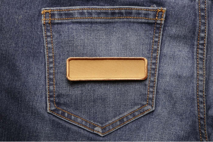 Tan Name Tag Blank Patch shown on jeans