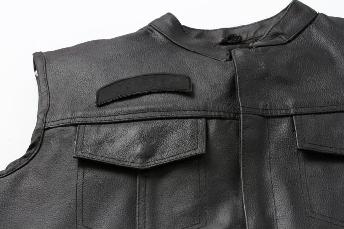 Black 4 Inch Arched Blank Patch Rocker - By Ivamis Trading - 4x1.5 inch - Twill Fabric - Paper Backing - Embroidered and Laser Cut Borders shown on leather vest