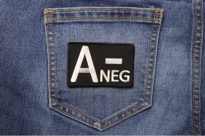 A NEGATIVE Blood Type Patch shown on jeans