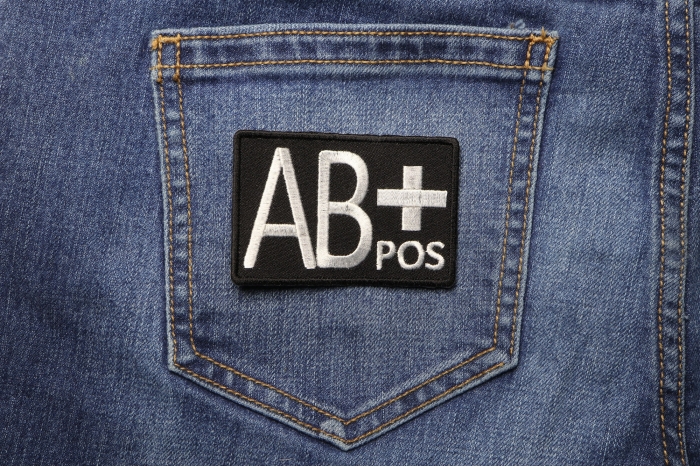 AB POSITIVE Blood Type Patch shown on jeans