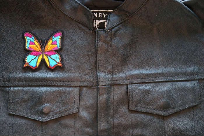 Butterfly Iron on Patch shown on leather vest