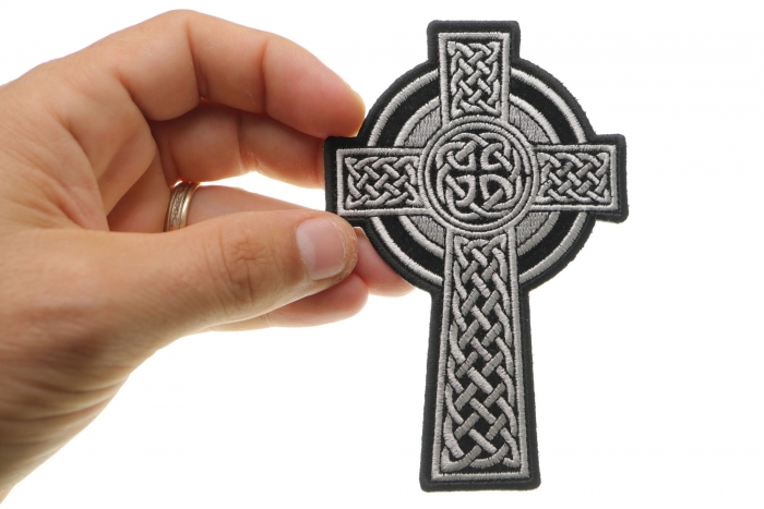 Celtic Cross Small Christian Patch shown on hand for size comparison