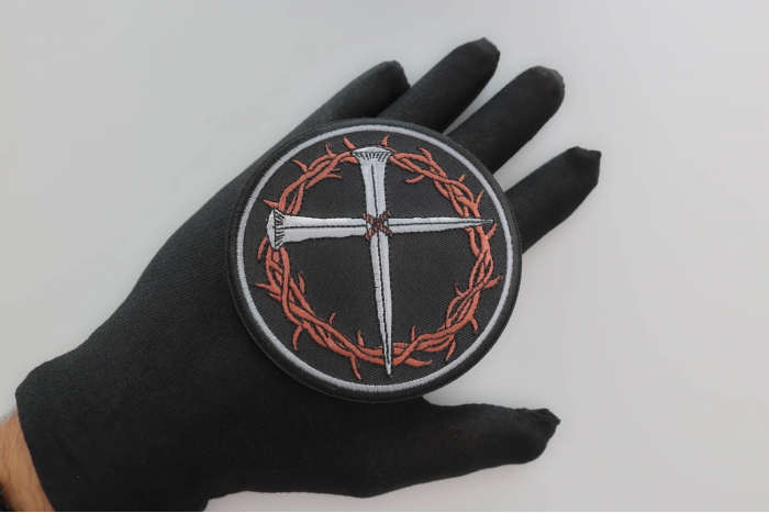 Cross Nails revised shown on hand for size comparison