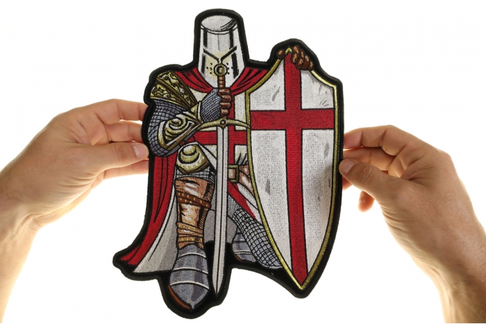 Red Kneeling Knight Patch, Large Christian Back Patches shown on hand for size comparison