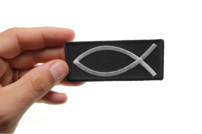 Christian Symbol Fish Sign Patch shown on hand for size comparison