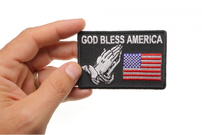 God Bless America Patch shown on hand for size comparison