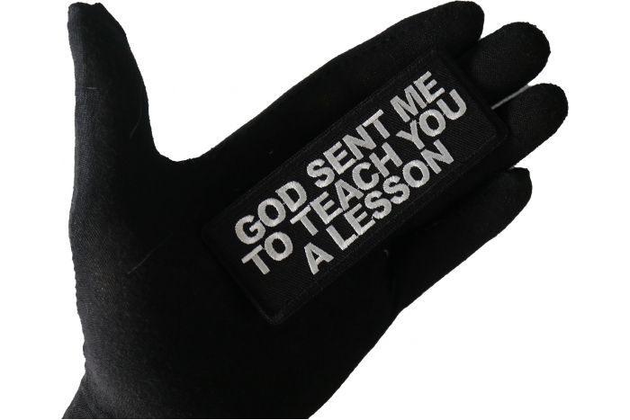God Sent me to Teach you a Lesson Patch shown on hand for size comparison
