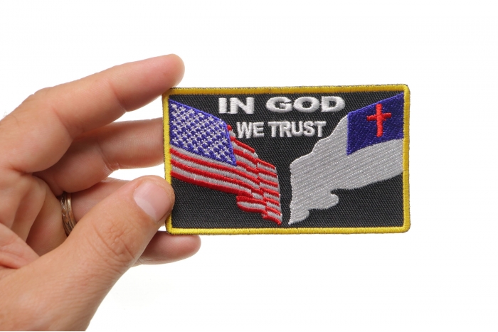 In God We Trust Patch shown on hand for size comparison