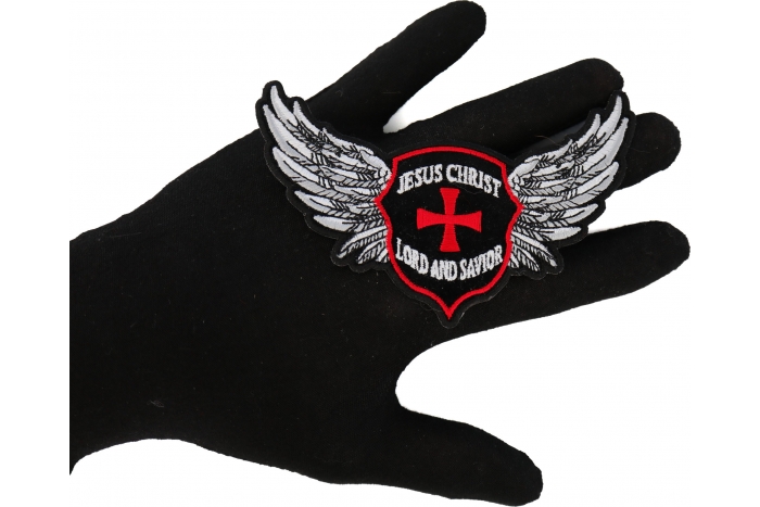 Jesus Christ Lord and Savior Wings Christian Iron on Patch shown on hand for size comparison