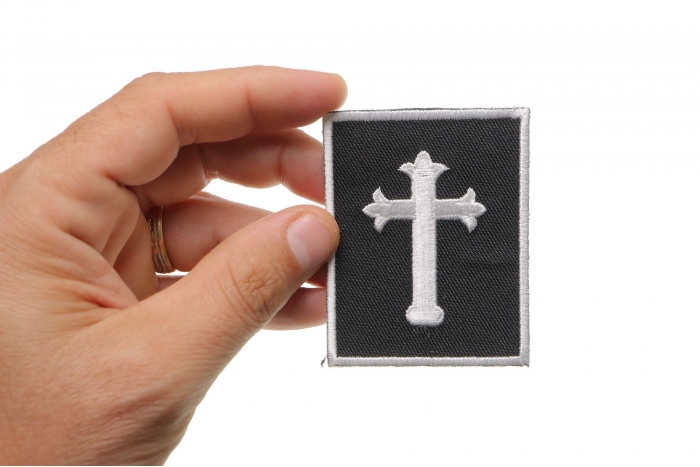 Jesus Cross Small Patch shown on hand for size comparison