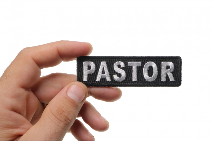 Pastor Patch shown on hand for size comparison