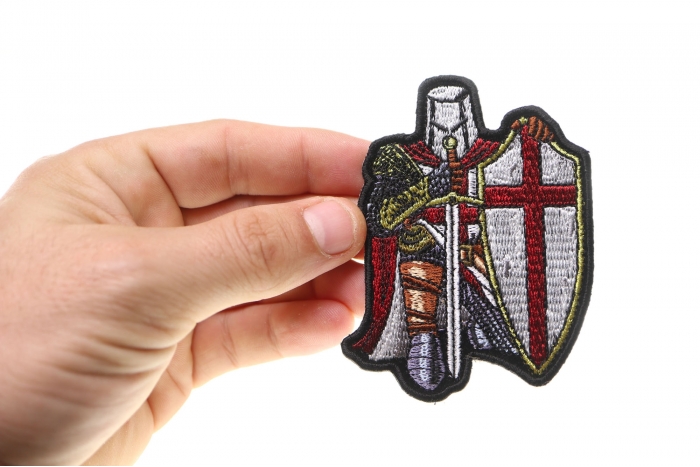 Red Knight Crusader Patch Mini Size shown on hand for size comparison