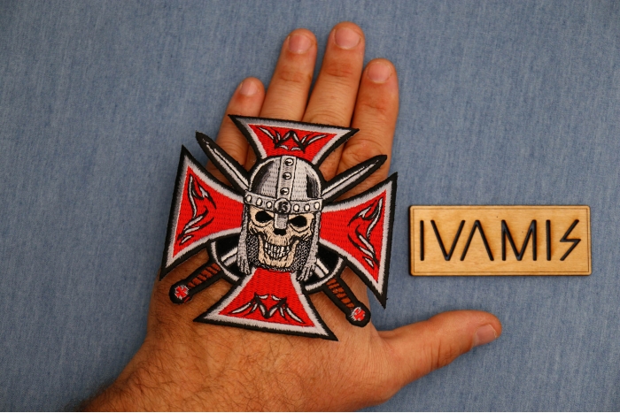 Red Maltese Cross Skull Knight Patch shown on hand for size comparison