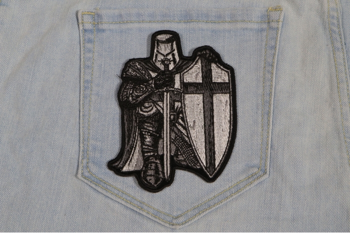 Black and White Crusader Knight Small Iron on Christian Patch shown on jeans
