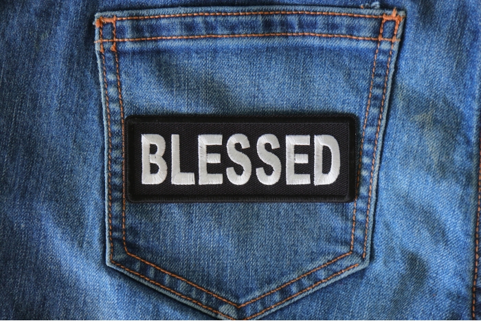 Blessed Iron on Christian Patch shown on jeans