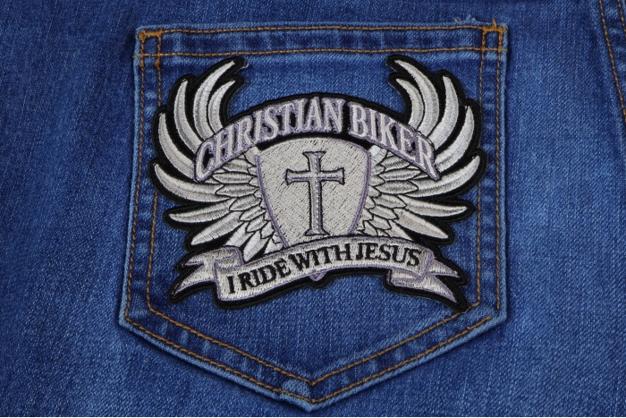 Small Christian Biker Patch I Ride With Jesus shown on jeans