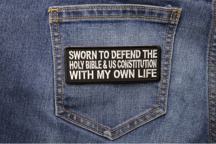 Sworn To Defend The Holy Bible and US Constitution With My Own Patch shown on jeans