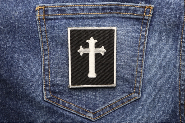 Jesus Cross Small Patch shown on jeans
