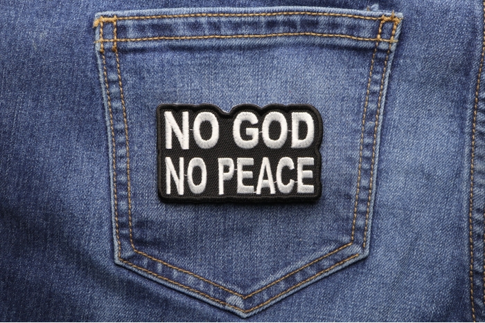 No God No Peace Patch shown on jeans