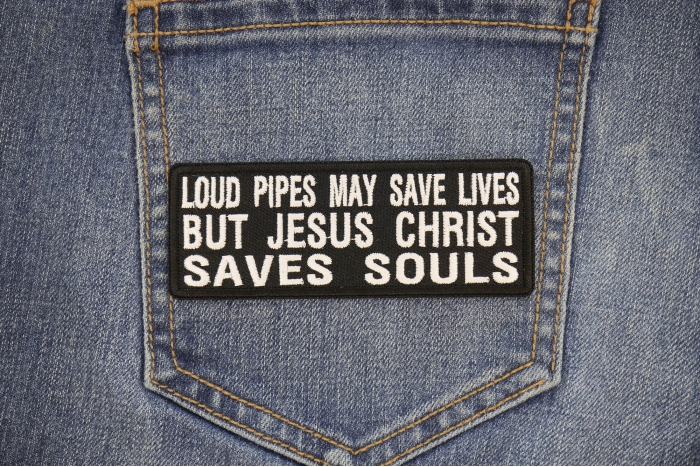 Loud Pipes May Save Lives But Jesus Christ Saves Souls Patch shown on jeans