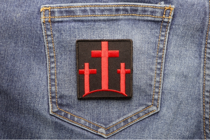 Three Crosses In Red Christian Patch shown on jeans