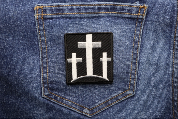 Three Crosses Christian Patch shown on jeans