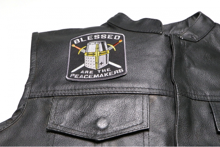 Blessed are The Peacemakers Knight Patch - 3.5x3.75 inch. Embroidered Iron on Patch shown on leather vest