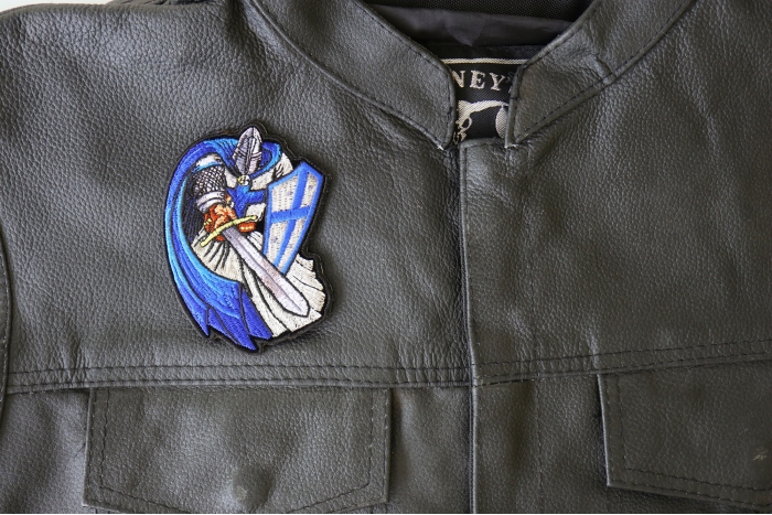 Blue Cape Knight Patch - 3x4 inch - Embroidered Iron on Patch shown on leather vest