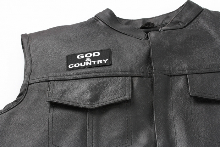 God and Country Patch - 3x1.5 inch. Embroidered Iron on Patch shown on leather vest