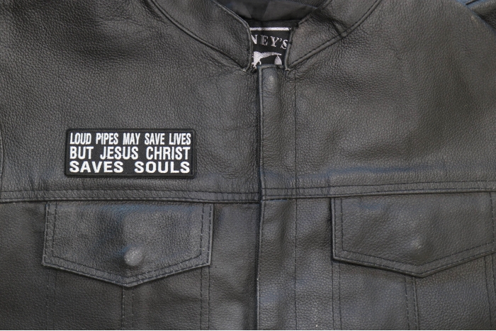 Loud Pipes May Save Lives But Jesus Christ Saves Souls Patch, Christian Saying Patches shown on leather vest