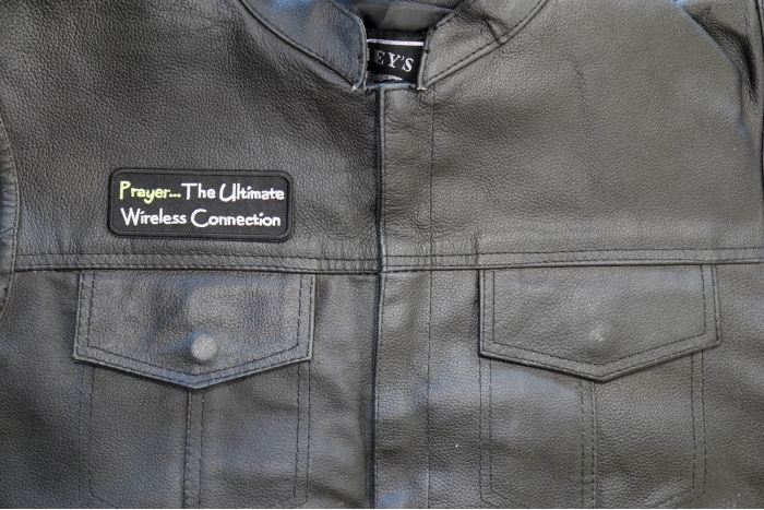 Prayer The Ultimate Wireless Connection Patch - 4x1.5 inch. Embroidered Iron on Patch shown on leather vest