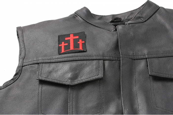 Three Crosses In Red Patch - 2.25x2.5 inch. Embroidered Iron on Patch shown on leather vest