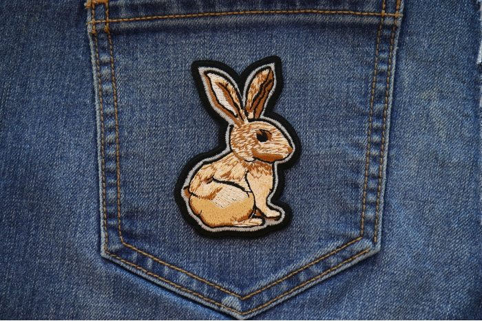Rabbit Iron on Patch shown on jeans