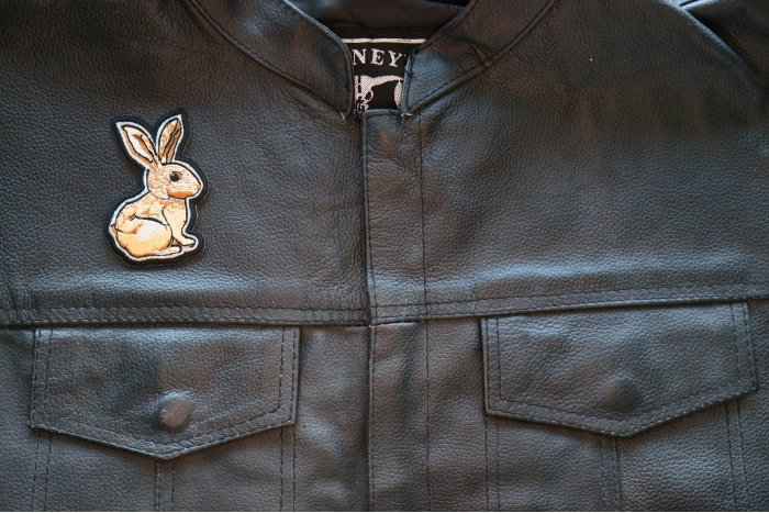 Rabbit Iron on Patch shown on leather vest