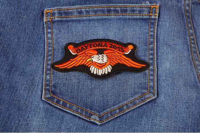 Daytona 2015 Orange Downwing Eagle Patch shown on jeans