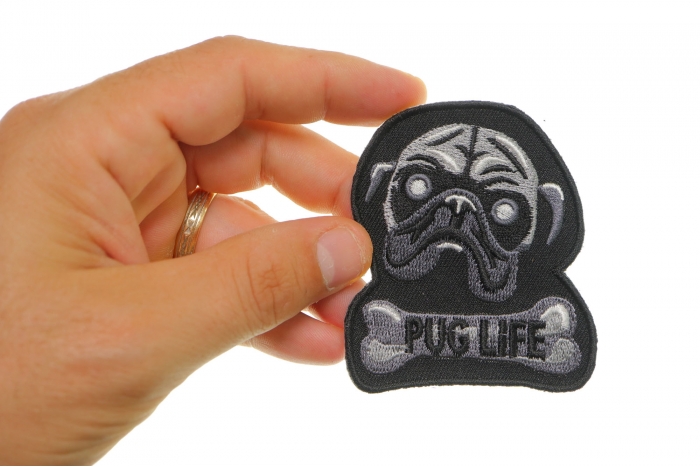 Pug Life Funny Iron on Patch shown on hand for size comparison