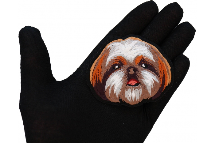 Shih Tzu Dog Patch shown on hand for size comparison