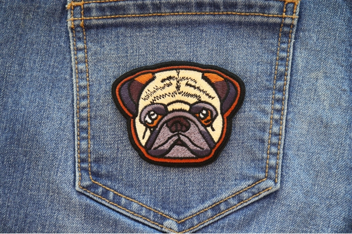 Cute Pug Dog Iron on Patch shown on jeans