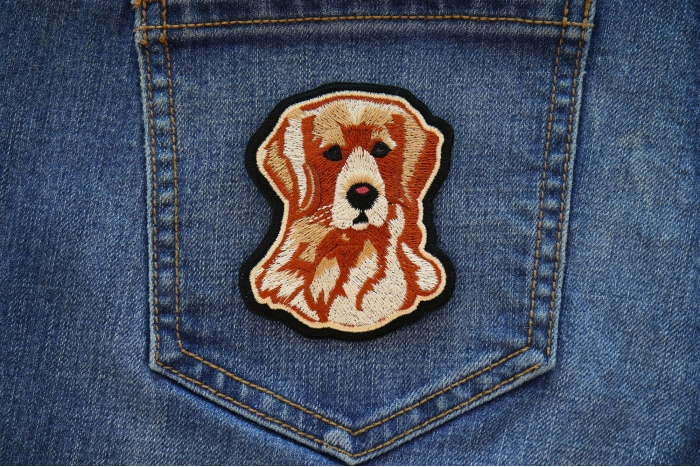 Handsome Retriever Dog Iron on Patch shown on jeans
