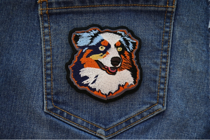 Proud Australian Shepherd Dog Iron on Patch shown on jeans